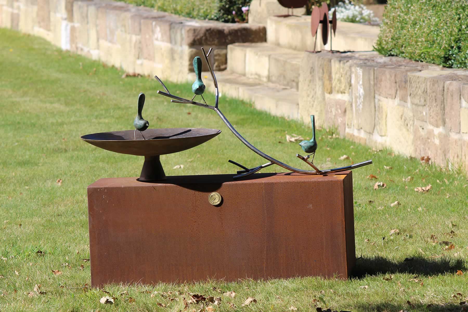 Bronze dish birdbath on corten plinth, stainless steel branch bronze birds