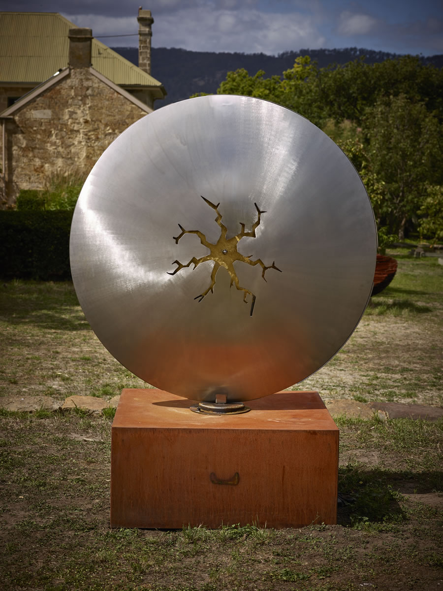 1.5m diameter, two sided stainless steel/corten steel/gold on swivel with exterior LED lighting (side 2)
