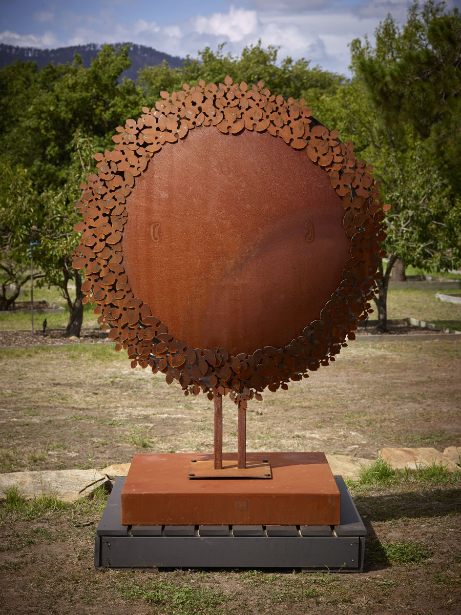 1.6m diameter, two sided corten steel/mirror stainless steel with exterior LED lighting (side 2)