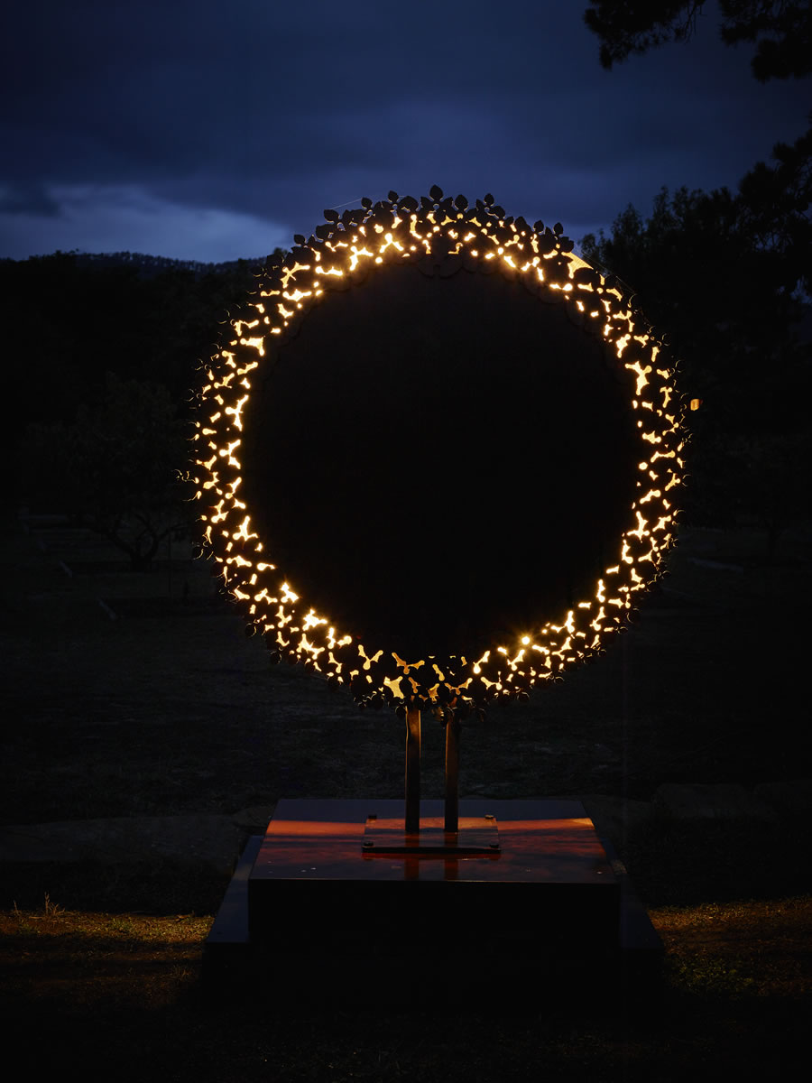 1.6m diameter, two sided corten steel/mirror stainless steel with exterior LED lighting (side 2)