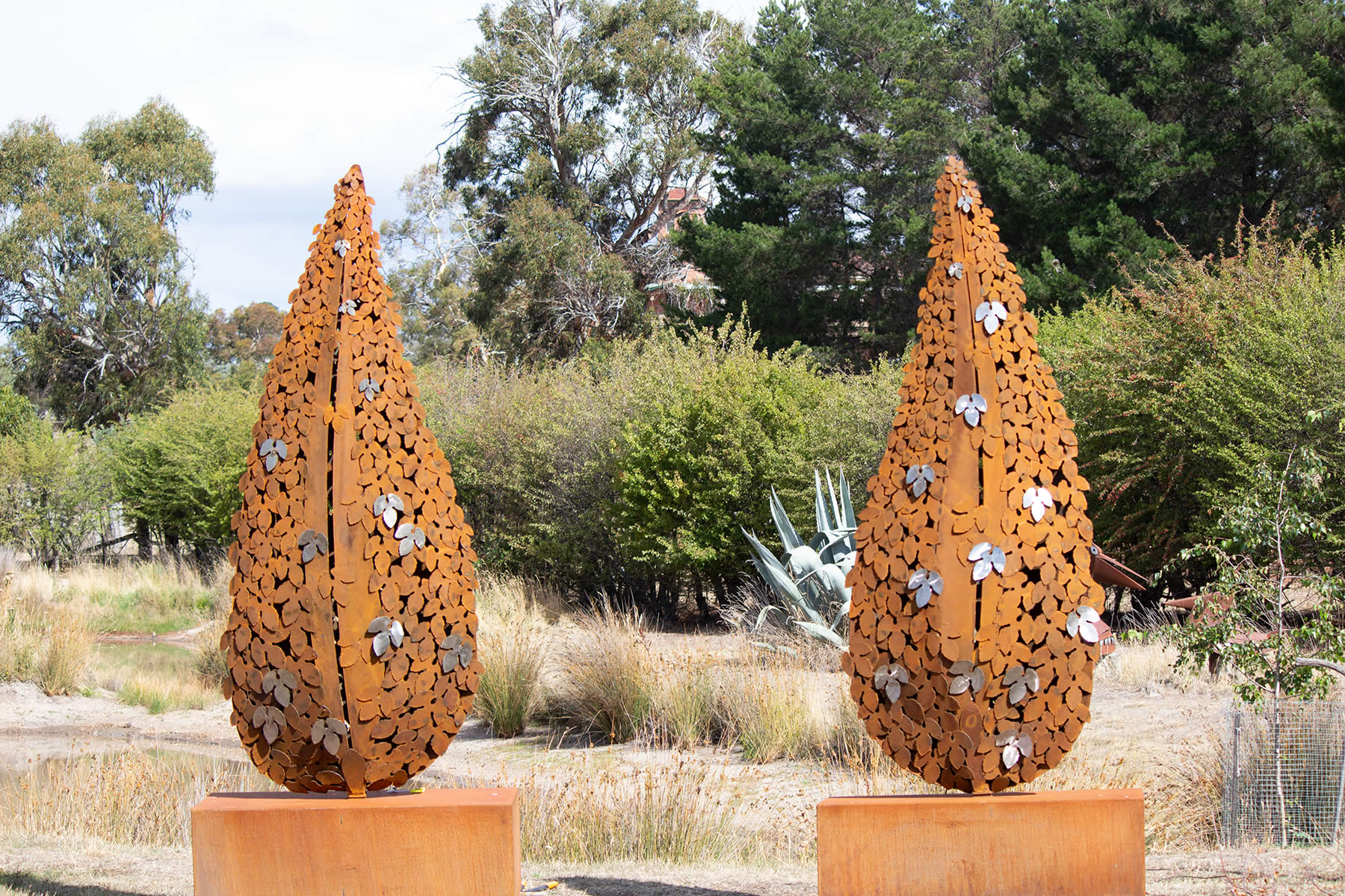 2.4m tall corten steel with stainless steel highlights